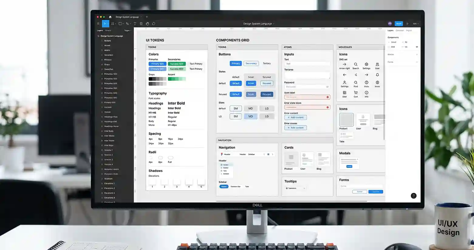 A wide monitor displaying a comprehensive Figma design system workspace. The interface shows a structured grid of UI tokens including color palettes, typography scales, and spacing rules. Alongside the tokens is a component grid featuring buttons in various states, input fields, icons, and navigation elements, showcasing a consistent and scalable product design language.